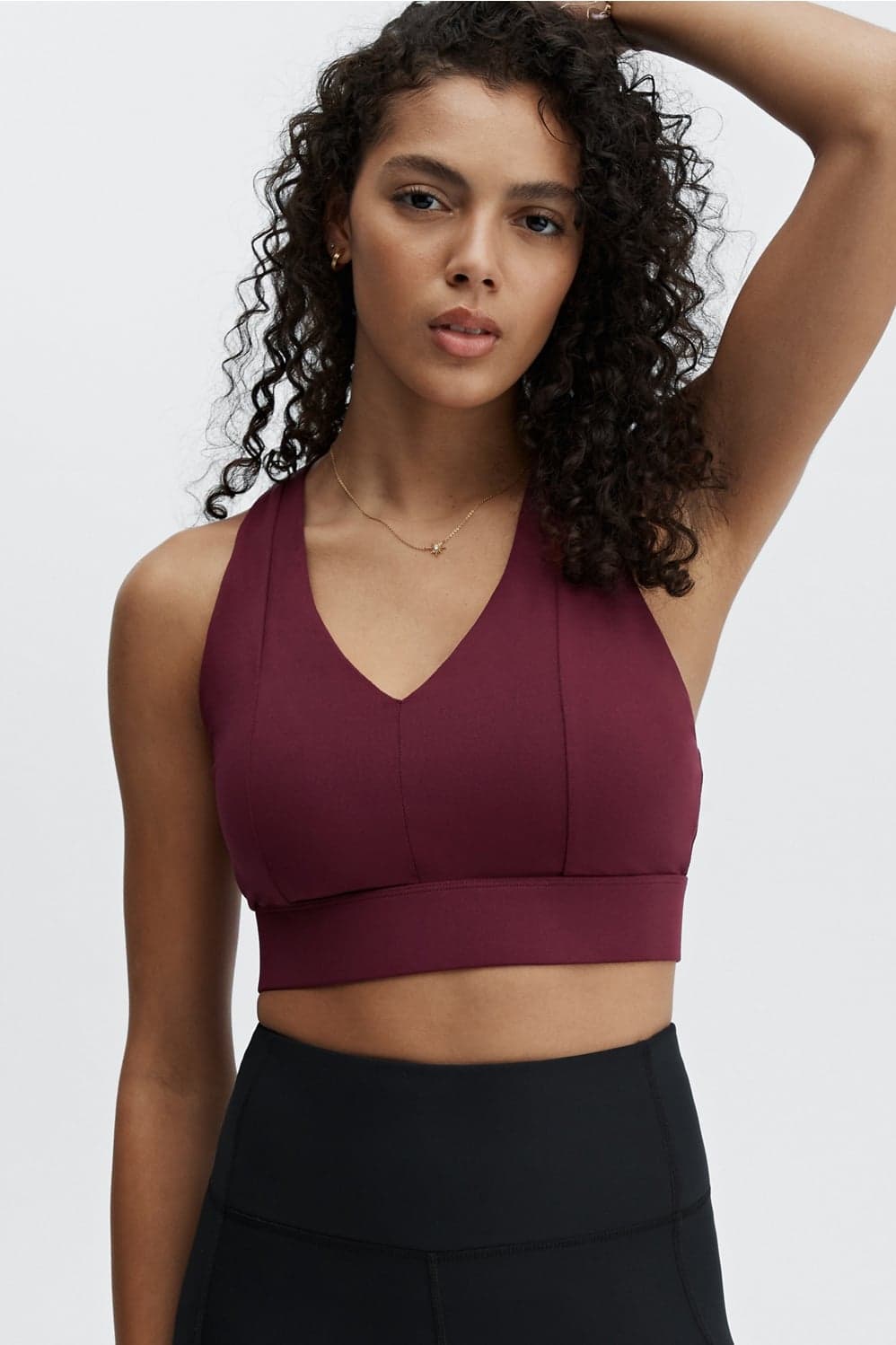 Fabletics On-The-Go Midi Medium Impact Sports Bra — Deep wine red top — image 1 of 3