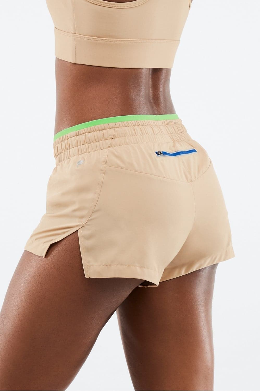 Fabletics Breathe Mid-Rise Running Athletic Shorts Cedar/Parakeet/Electric Blue — Light warm beige trouser — image 1 of 5