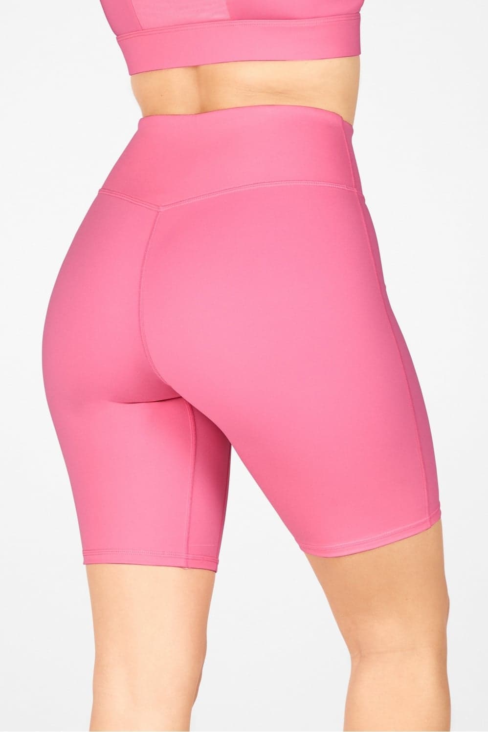 Fabletics Anywhere High-Waisted Short 9" — Bright pink trouser — image 1 of 3